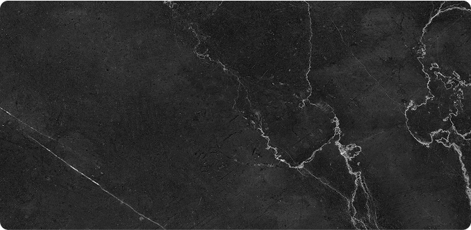Premium Stones – High-quality black marble with intricate white veining, perfect for luxury interiors.