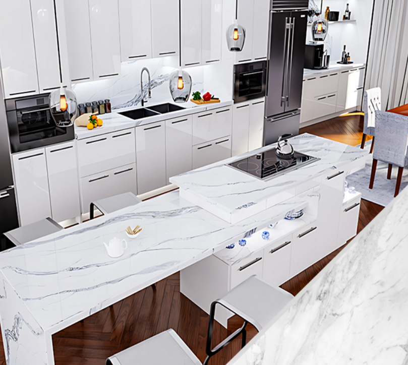 A luxurious modern kitchen featuring sleek white cabinetry and elegant marble countertops.